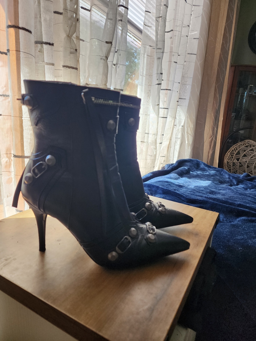 Black Pointed-Toe Ankle Boots with Buckle Accents